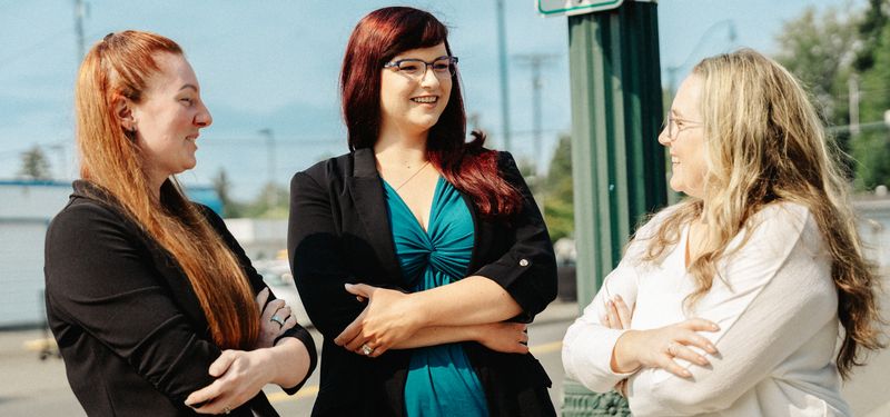 The three-person team outside, DM Tax & Bookkeeping