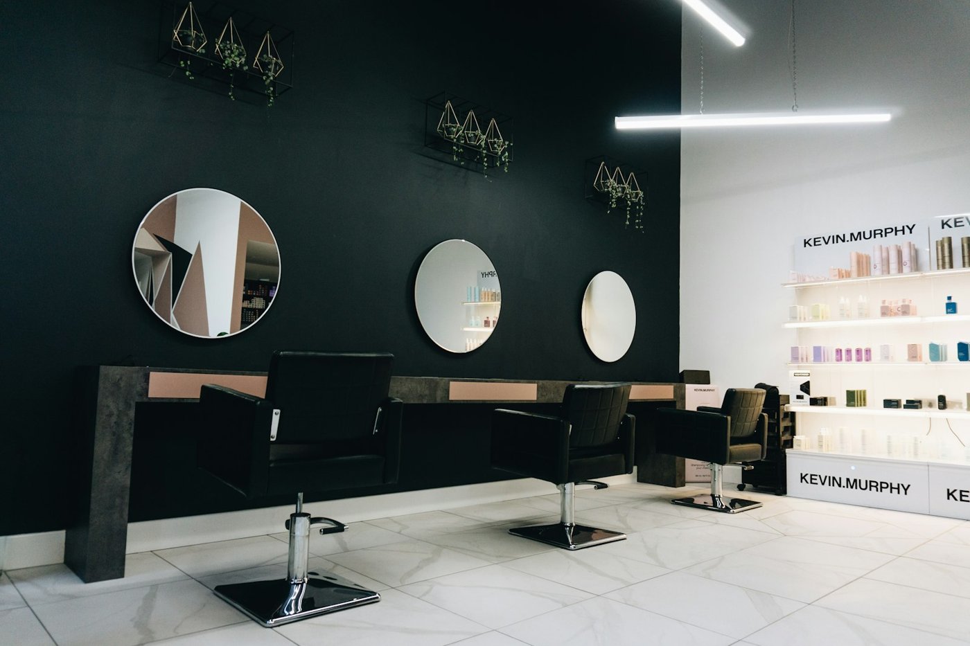 Modern hair salon interior with styling stations